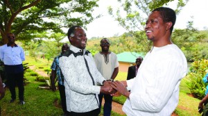 •PRESIDENT Edgar Lungu (right) greets former United Party for National Development vice president Richard Kapita who joined the Patriotic Front at a rally addressed by the President in Mwinilunga.Picture by EDDIE MWANALEZA.